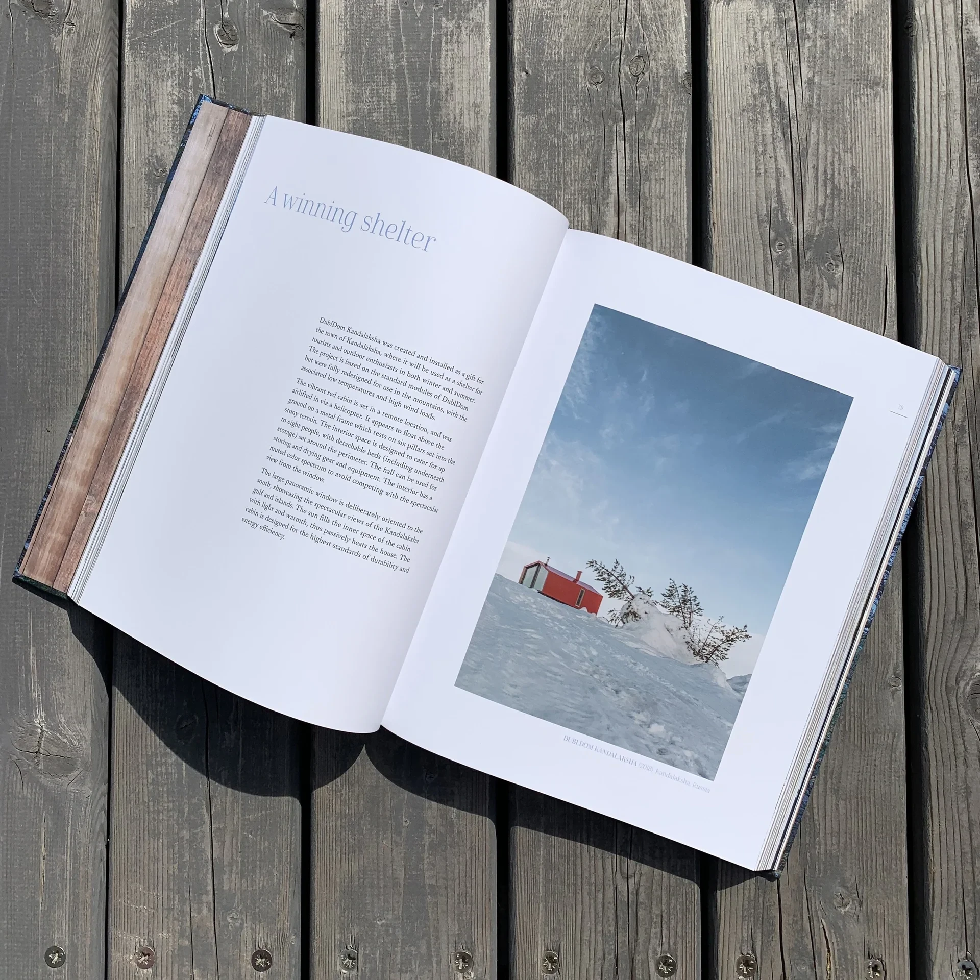 Open book spread titled A winning shelter