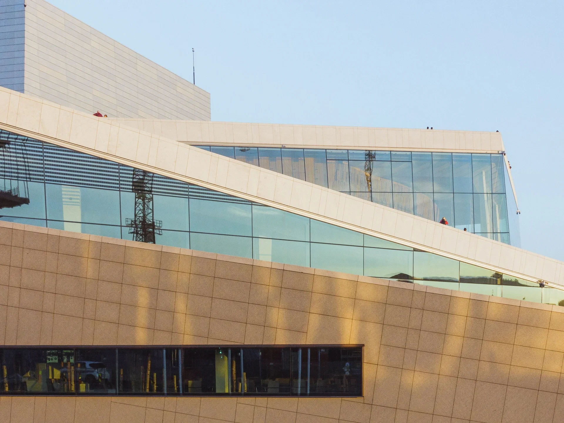 Angled glass and stone roofline of the Opera House
