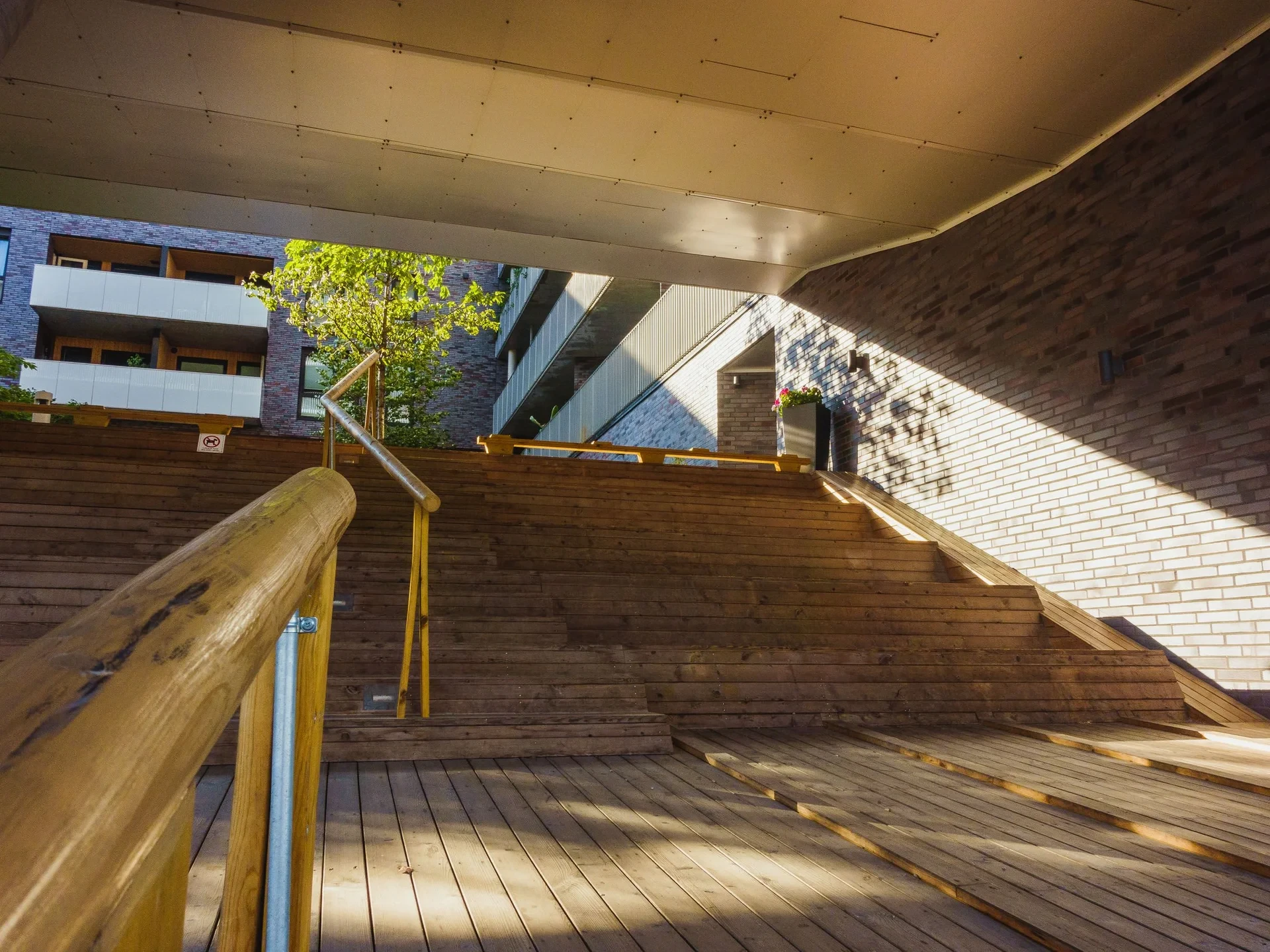 Timber steps and ramp between apartment blocks