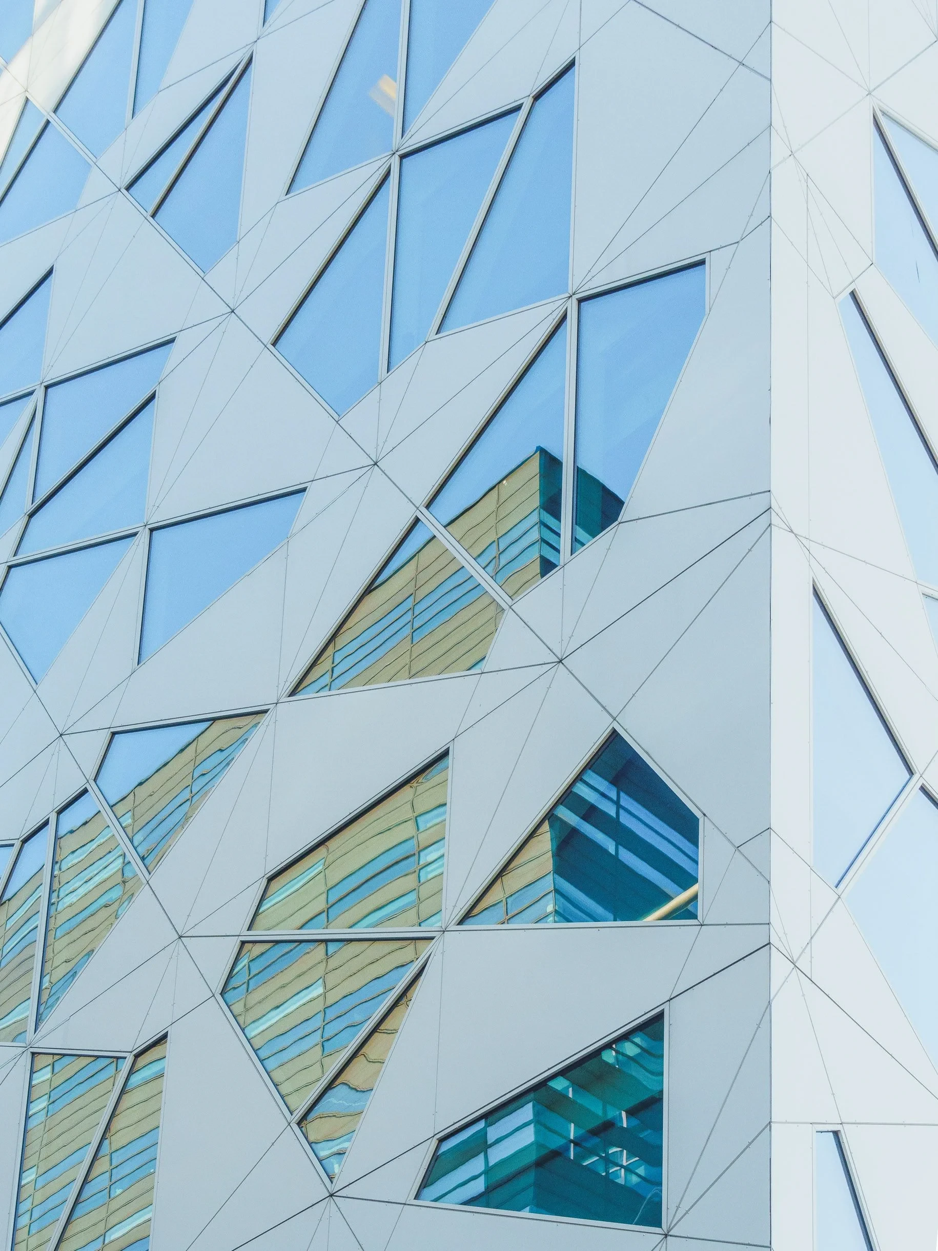 Glass facade with triangular pane pattern