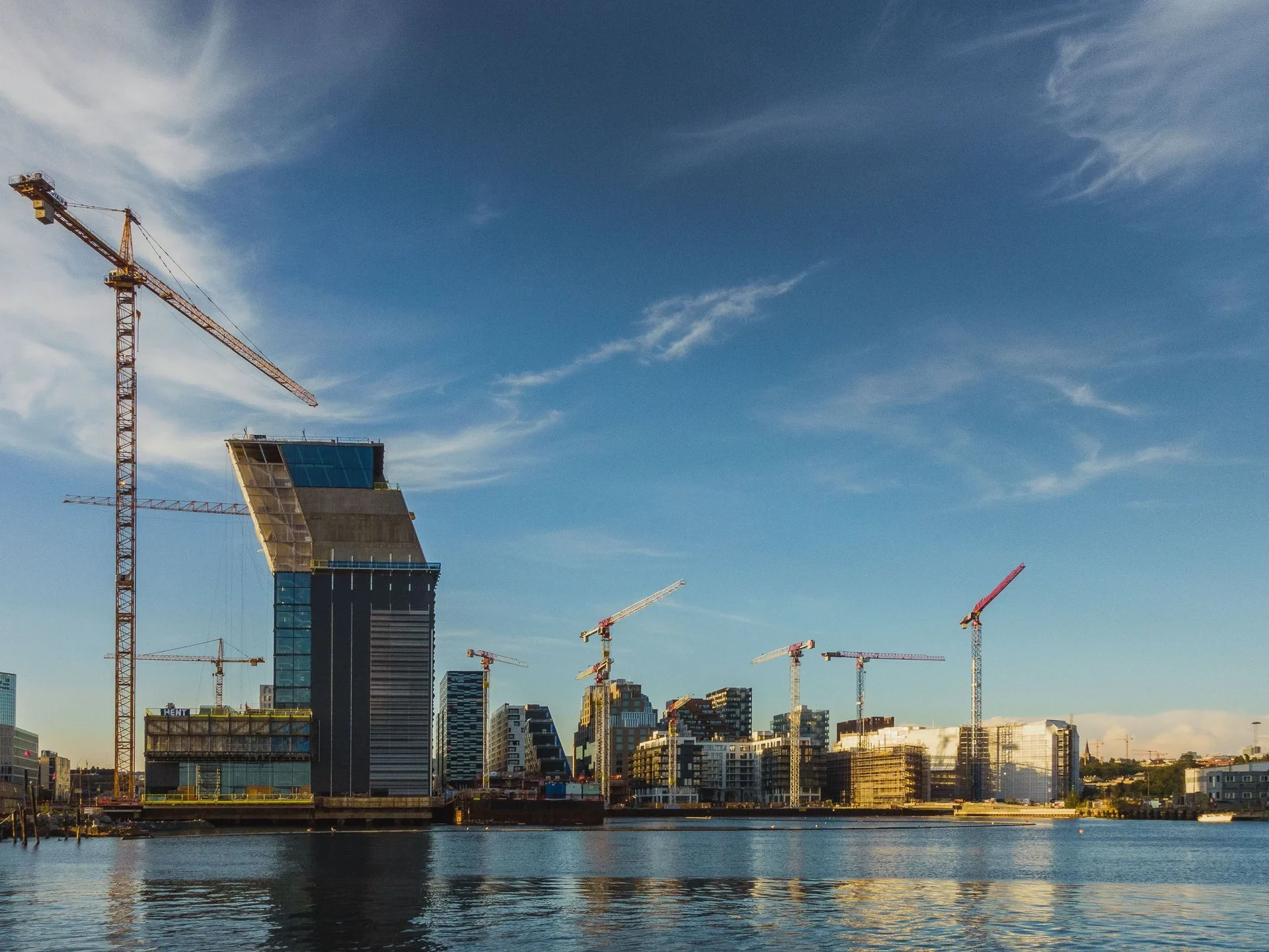 Waterfront construction cranes at the harbour